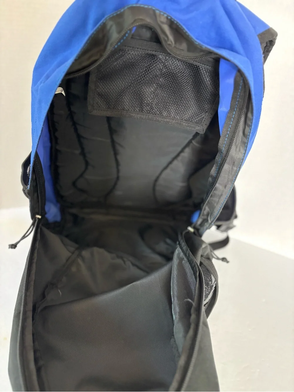 The Umbro soccer backpack features a distinctive blue diamond pattern